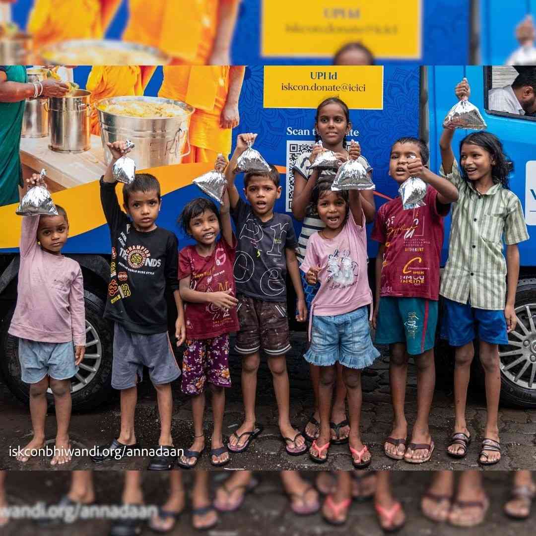 Devotees distributing sanctified food